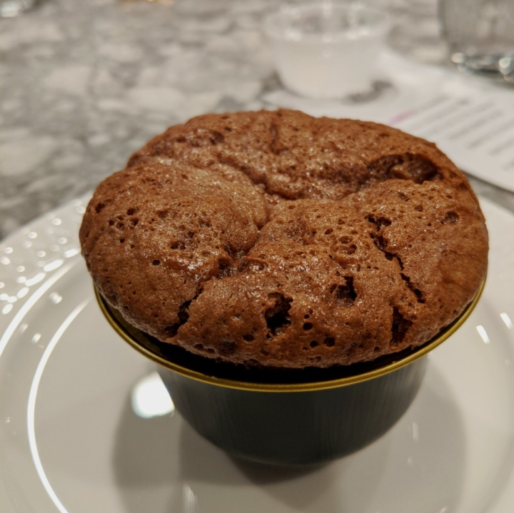 A chocolate soufflé right out of the oven.